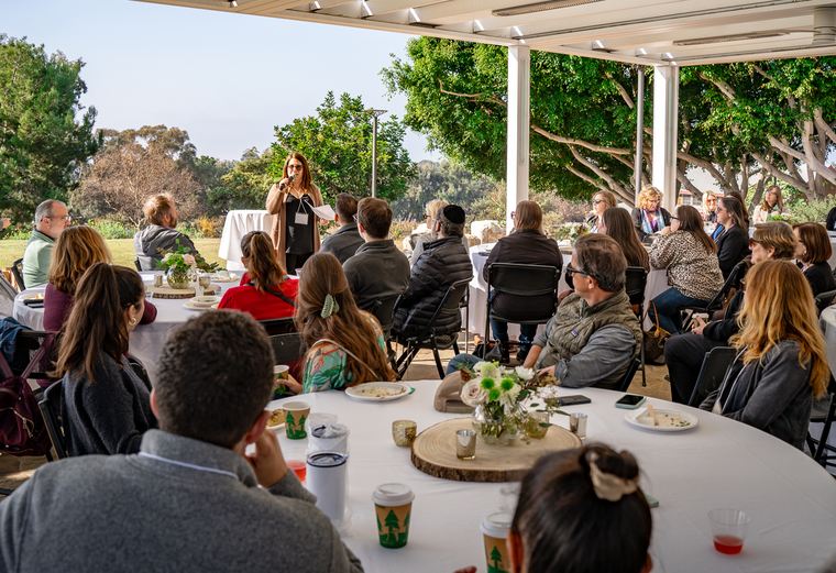 Attendees seated for remarks at the JPro Brunch of Appreciation